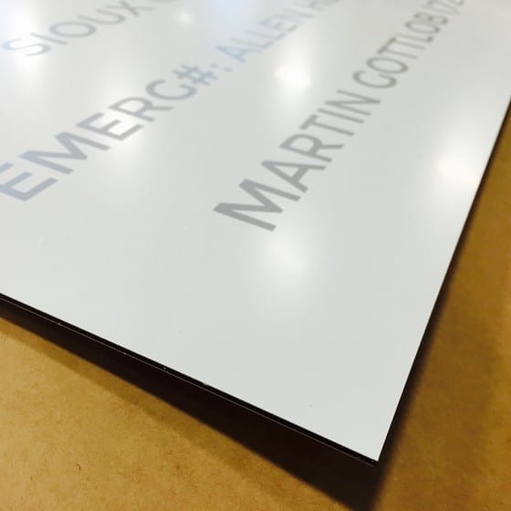 aluminum sign with design not covering entire surface