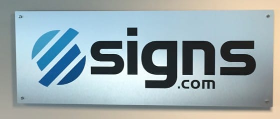 custom brushed aluminum sign with standoffs