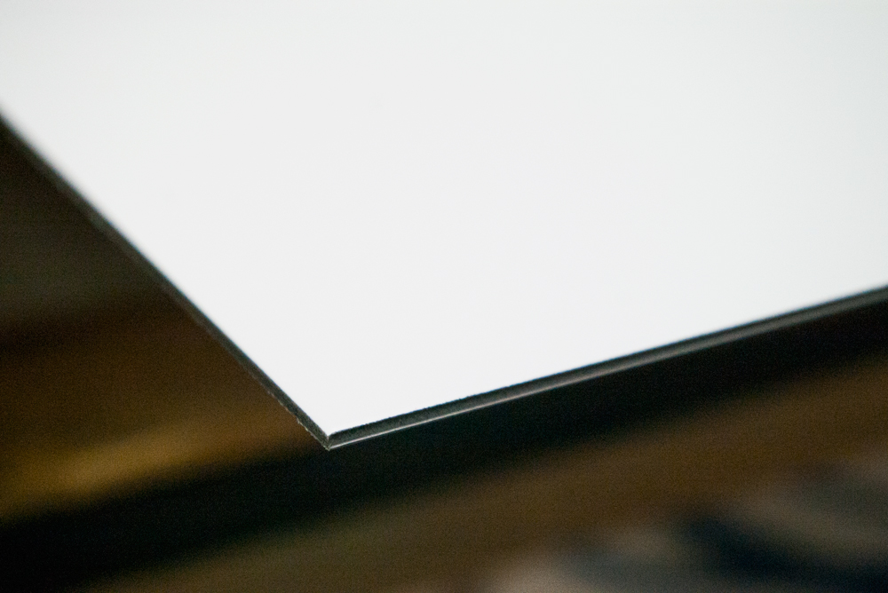 Standard vs. Brushed Aluminum Signage 101