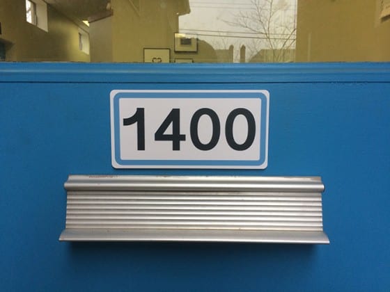 plastic door number sign