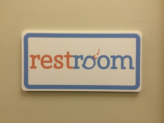 plastic restroom sign