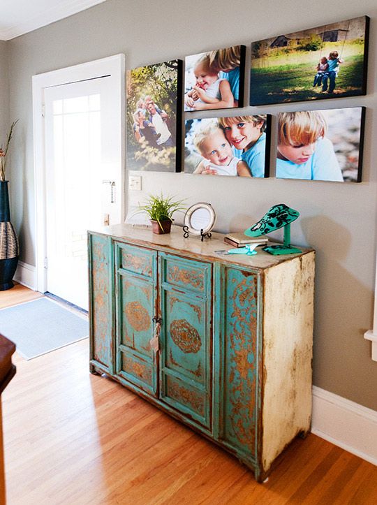 family prints above dresser