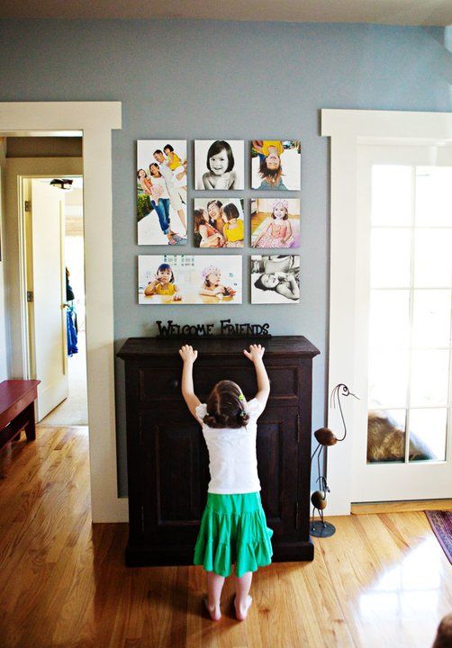 family prints above dresser