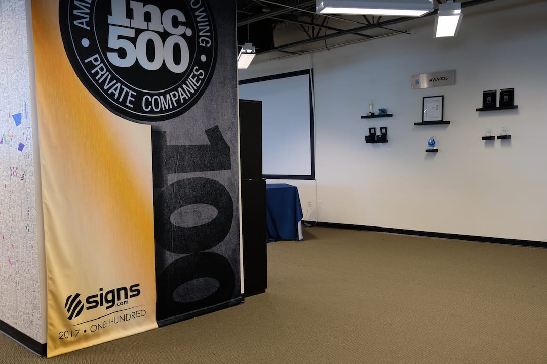 Signs.com Inc. 500 awards wall